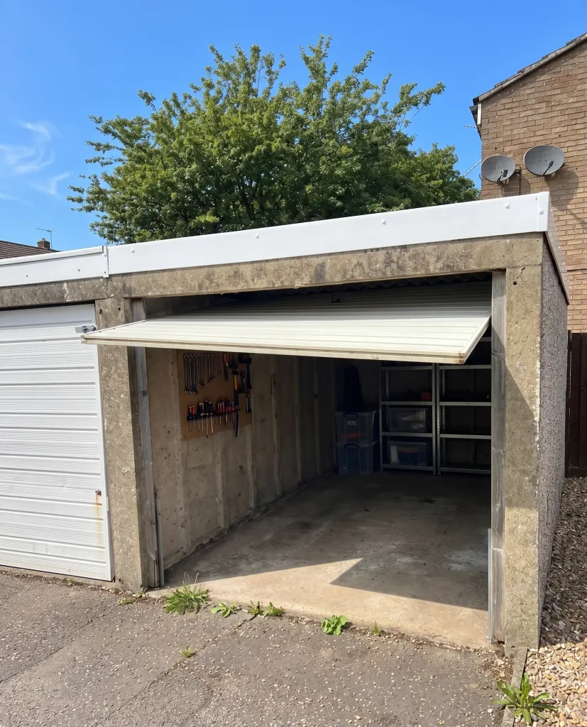 Broken Garage Door Repair in Progress